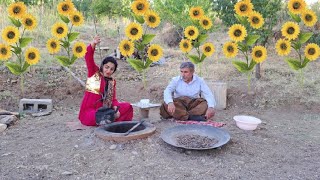 سبک زندگی و روزمرگی دختر روستایی در کردستان ایران/برداشت تخمه محلی در باغ روستا/آشپزی در طبیعت