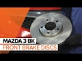 How to change front brake discs and front brake pads on MAZDA 3 BK TUTORIAL | AUTODOC