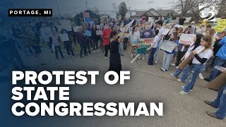 Protesters call on Rep. Huizenga to stand up to Trump administration on climate