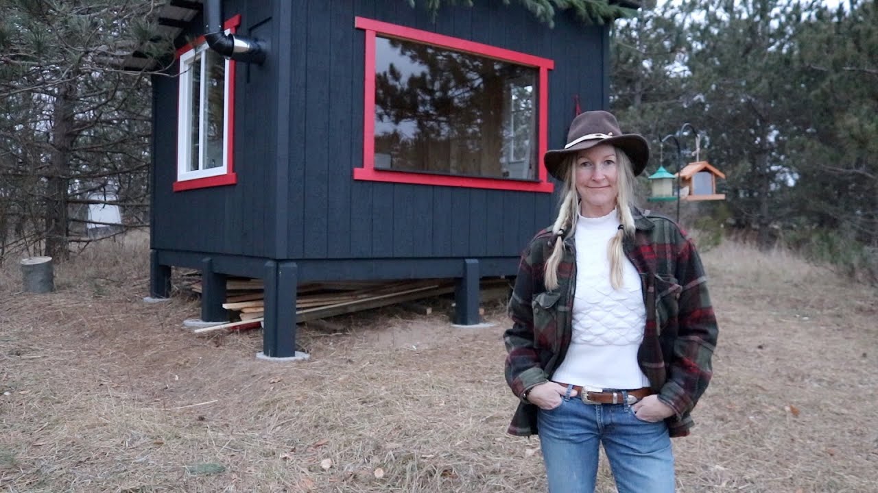 I painted our cabin black- PLUS my unusual door. DAY 5-6 Tiny Cabin