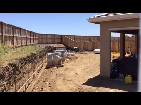 How to install retaining wall foot-in - YouTube