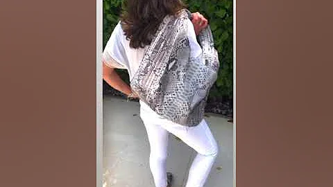 Design and luxurious genuine python leather combine to create these fabulous hobo bags.