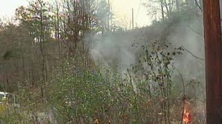 Forestry officials fight forest fire in Harlan County