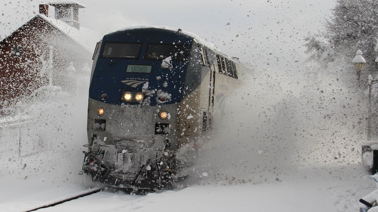 Amtrak train plows through snow banks at 80MPH YouTube