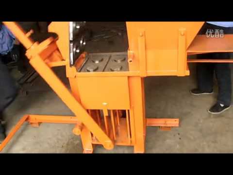 QMR2-40 manual clay interlocking brick making machine - YouTube