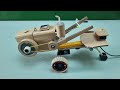 Homemade cardboard tractor model with a driver