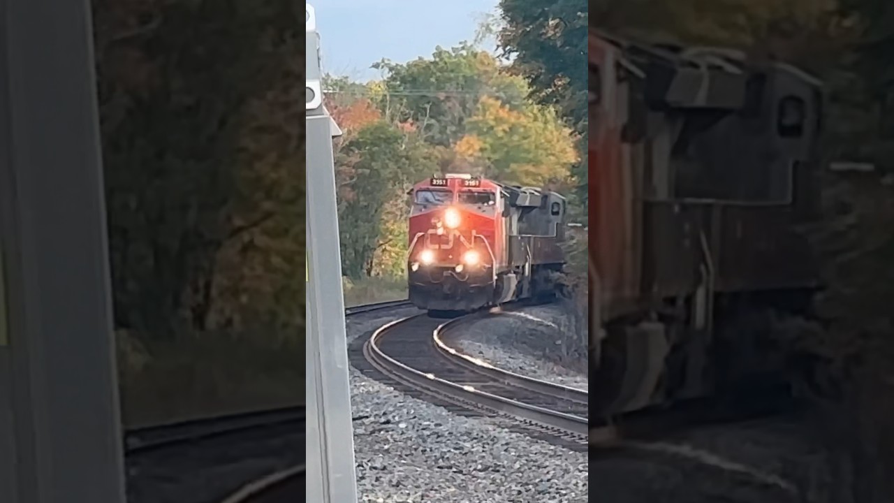 2 CN Trains Passing Izabella Street in Parry Sound at the Same time