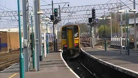 Northern Rail 153304, 158908 and DB Schenker 66004 at Carlisle 20/4/09