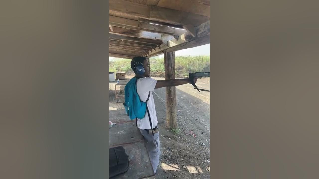 12 Gauge shotgun One Hand!!!