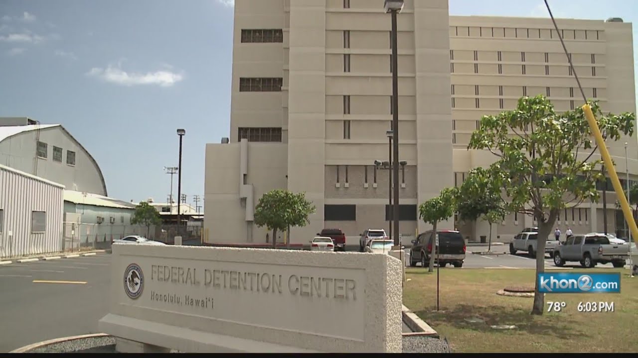 Two asylum seekers from China held at Federal Detention Center