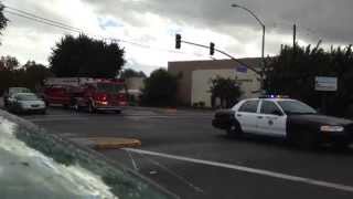 LBFD truck 11 and rescue 11 with lbpd clearing the intersection