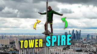 Climber Climbed the Spire on Top of a Tower at 264 Meters High as Drone Films