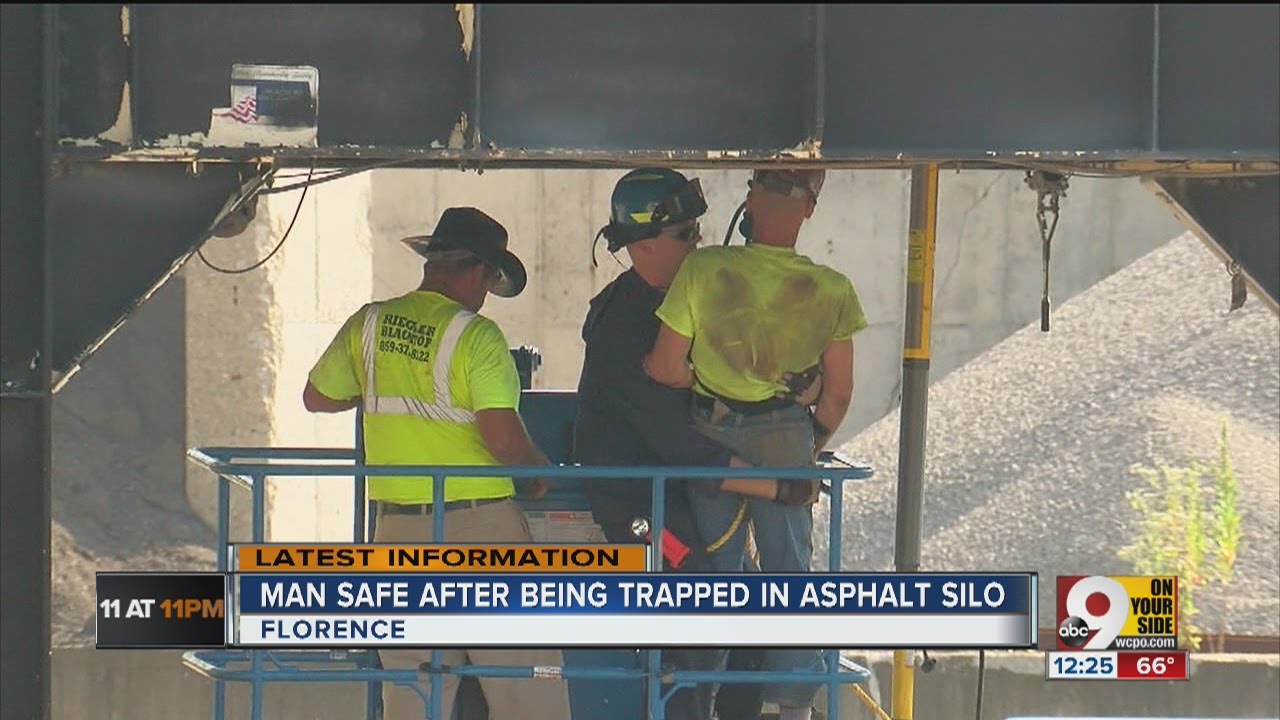 Man safe after being trapped in asphalt silo - YouTube