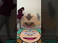 Toppling AVATAR in Dominoes!