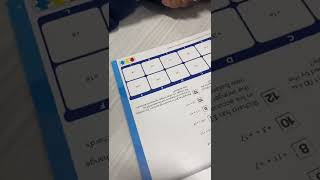 Students Solving Hands-On Self-Checking Math Activity