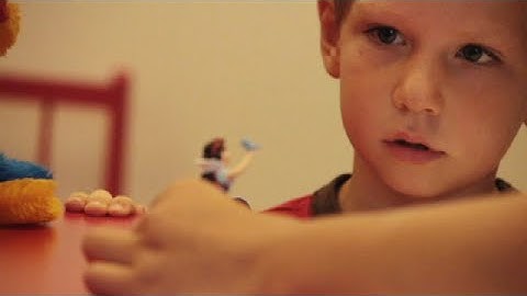 A Child and a Puppet: How Children Learn Language