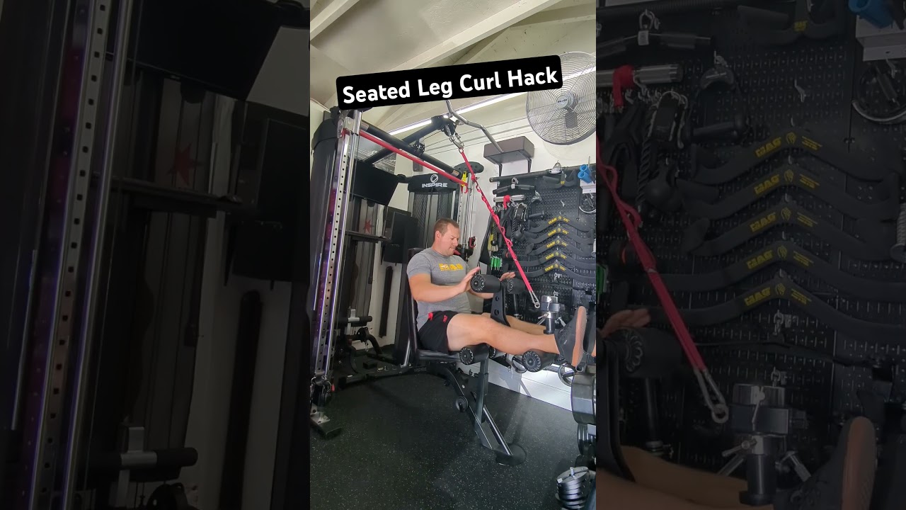 Seated leg curls with the Inspire Leg Developer