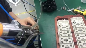 Hand held push down screw locking machine