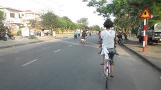 Audrey Kian on bicycle in HoiAn
