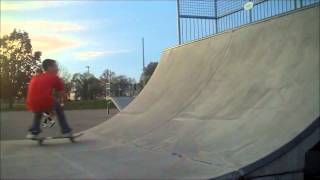 Mike Lyons - Frontside 180 Indy on Half Pipe
