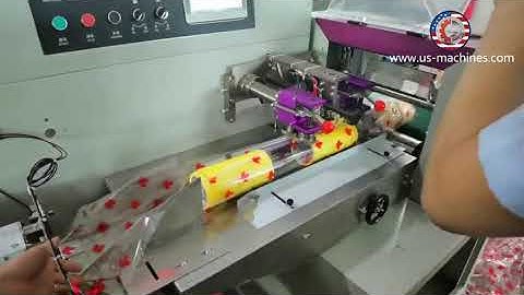 Automatic tape rolls feeding horizontal type pillow bag packing machine with tape rolls detecting fi