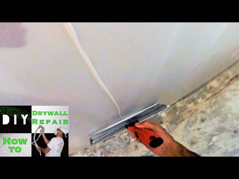 How to skim coat a wall in less then 10 minutes | Diy Drywall Tips and Tricks