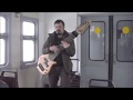 Russian Busker..12 string Bass on a Train.. brilliant