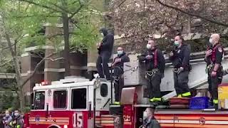 FDNY firefighter plays "The Star Spangled Banner" in tribute to health care workers | ABC News