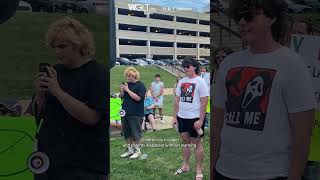 Rally crowd opposes federal immigration crackdown after ICE arrest at McLean County courthouse