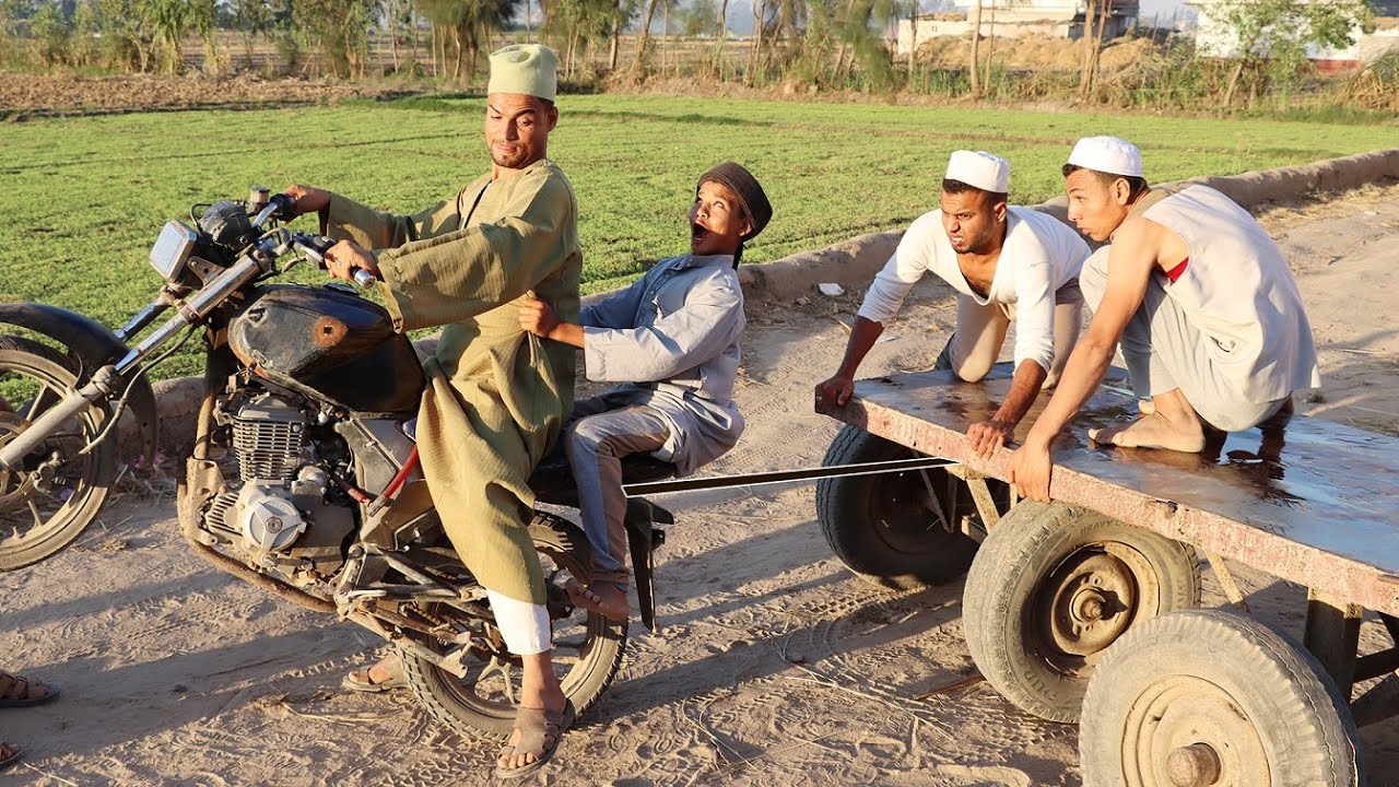 تحدى شد الكرو بالموتوسيكل أغرب تحديات العالم بسيونى الجبار