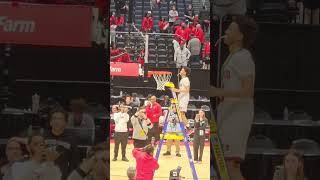 Chase Shumate A.K.A Mr. Clamps cut the nets down as 2026 State Champion Trotwood High School