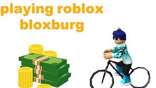 playing Roblox bloxburg! / finishing my house / working