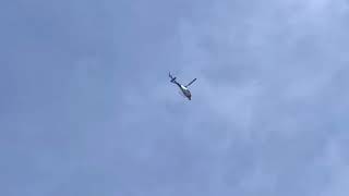 Helicopter H125 fly overhead and circle around Approach MDW.