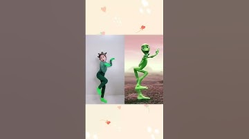 Thumbnail of Baby jumping with green frog