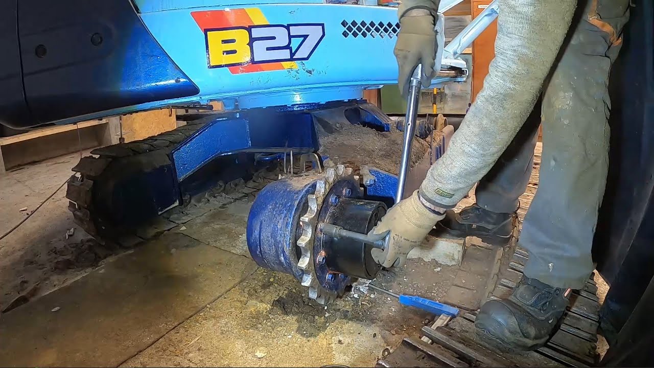 Installing a new final drive on a mini excavator