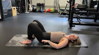 Glute Bridge with Ball Squeeze