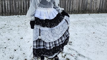 Noire et Blanche - a tiered skirt collage of lace, fabrics, and trims