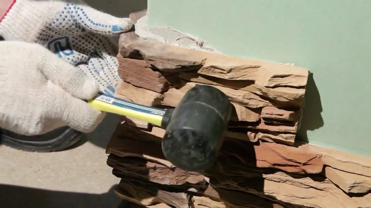 Installation of artificial decorative stone and tile with their hands
