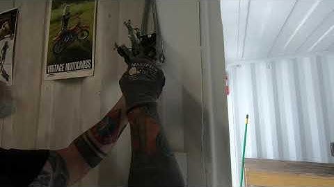 Building a Shipping Container Garage, part 14, Wiring in the light and plug outlets