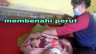 benahi perut sebelah kiri yang keras dan nyeri.