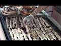 New York Street Food from the World. Grilled Sausages, Chicken, Quesadilla, Arepas, Crepes and more