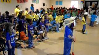 Students sing "Down On Grandpa's Farm"
