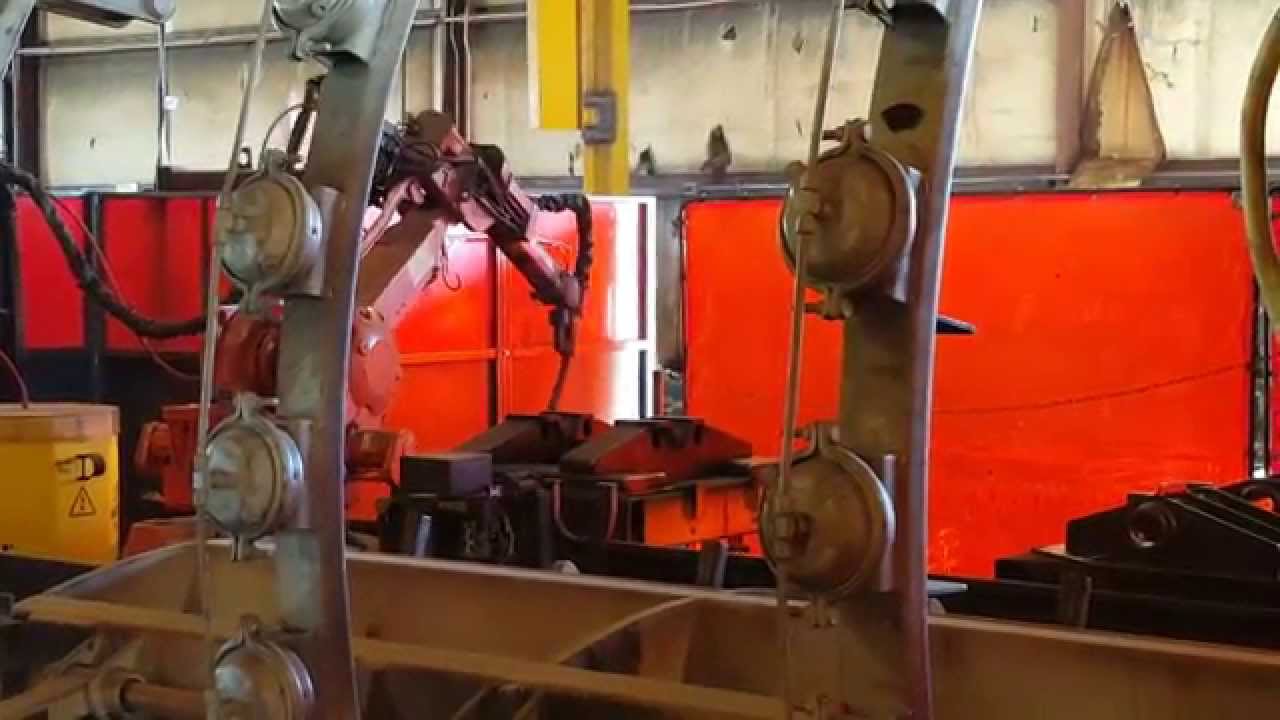 Robot welding kingpin plate YouTube