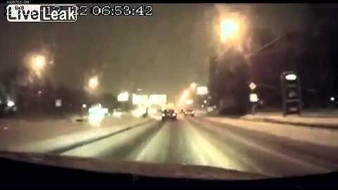 Pedestrian running across the road barely misses car