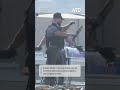 Spanish Police in Riot Gear Escort Migrants to New Camp in Ceuta