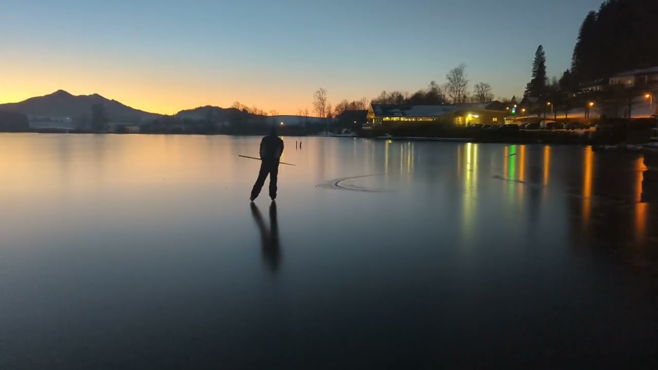 Ripping sounds of tearing up an ice sheet at Hopfensee Bavaria
