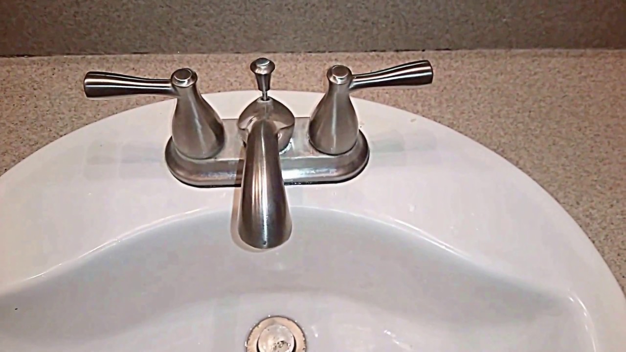 Clean Stainless Steel Bathroom Sink With Rubbing Alcohol ...