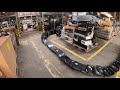 Oddly satisfying moment a tech team smashed the world record for the biggest domino chain of laptops