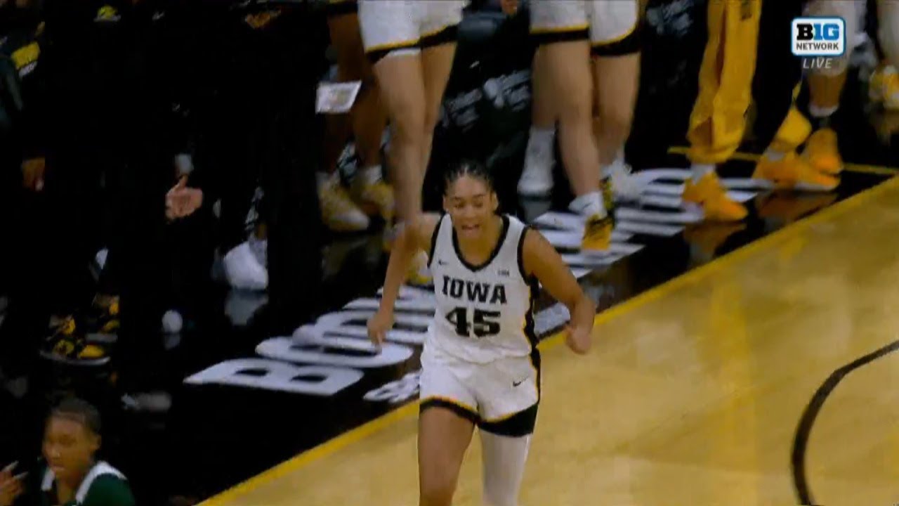 No. 11 Iowa tops No. 15 Michigan State