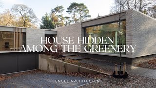 Modern Minimalist House Design With The Surroundings In The Forest Green In Harmony screenshot 4